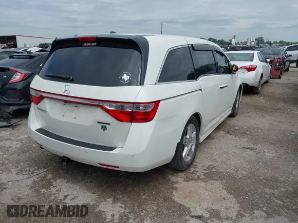 ✅ 2012 Honda Odyssey Touring • VIN: 5FNRL5H9XCB145566 • Лот: 45050077. Опубліковано раніше на IAAI з пробігом 122 167 миль. Безкоштовний доступ до архіву аукціонних продажів зі США та докладний звіт про історію автомобіля на DreamBid. Зображення 4.