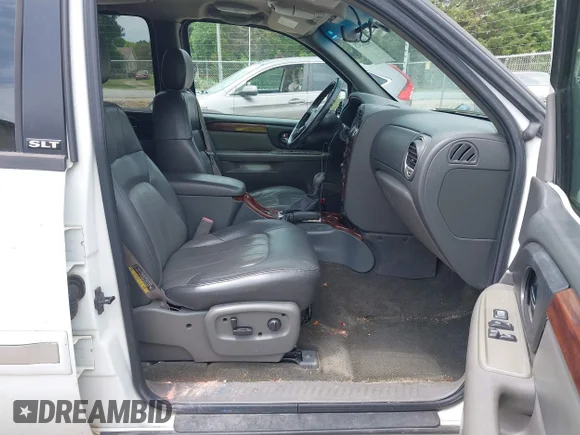 ✅ 2004 GMC Envoy SLT • VIN: 1GKDS13SX42114116 • Lot: 42282415. Wystawiony na IAAI z przebiegiem 245 526 mil. Bezpłatny archiwum sprzedaży aukcyjnych z USA i szczegółowy raport historii pojazdu na DreamBid. Zdjęcie 5.