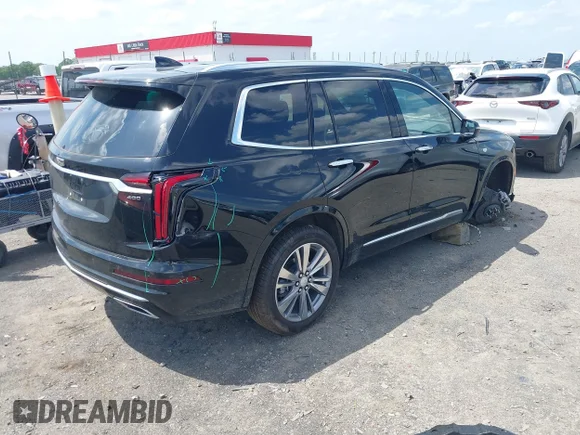 ✅ 2025 Cadillac XT6 AWD Premium Luxury • VIN: 1GYKPDRS3SZ118214 • Лот: 42100315. Опубликован ранее на IAAI с пробегом 12 795 миль. Бесплатный доступ к архиву аукционных продаж из США и подробный отчёт об истории автомобиля на DreamBid. Изображение 4.