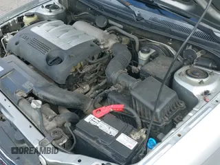 ✅ 2003 Kia Spectra • VIN: KNAFB121435216518 • Lot: 42475145. Listed on IAAI with 79,709 mi. Free auction sales archive from the USA and detailed vehicle history report at DreamBid. Image 19.