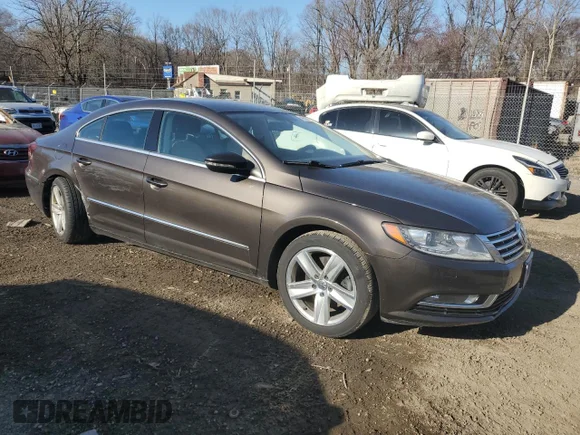 ✅ 2014 Volkswagen CC Sport • VIN: WVWBP7AN4EE507971 • Лот: 49602395. Опубліковано раніше на Copart з пробігом 73 009 миль. Безкоштовний доступ до архіву аукціонних продажів зі США та докладний звіт про історію автомобіля на DreamBid. Зображення 4.