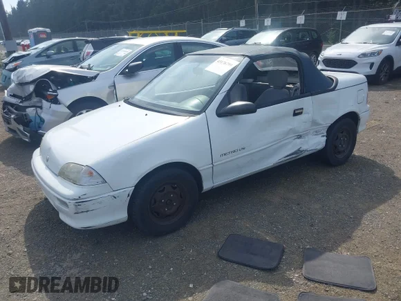 ✅ 1992 Geo Metro • VIN: JG1MR3367NK214464 • Lot: 43176799. Listed on IAAI with 90,652 mi. Free auction sales archive from the USA and detailed vehicle history report at DreamBid. Image 2.