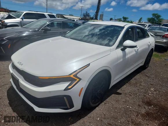 ✅ 2025 Kia K5 LXS • VIN: KNAG24J73S5357784 • Lot: 59911816. Wystawiony na Copart z przebiegiem 19 681 mil. Bezpłatny archiwum sprzedaży aukcyjnych z USA i szczegółowy raport historii pojazdu na DreamBid. Zdjęcie 1.