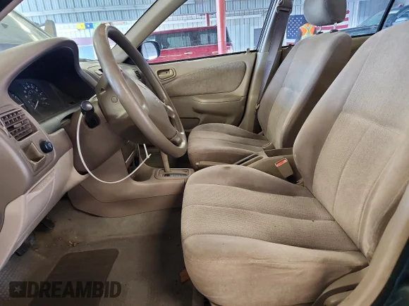 ✅ 2002 Toyota Corolla CE • VIN: 1NXBR12E32Z653135 • Lot: 79029195. Wystawiony na Copart z przebiegiem 111 719 mil. Bezpłatny archiwum sprzedaży aukcyjnych z USA i szczegółowy raport historii pojazdu na DreamBid. Zdjęcie 7.