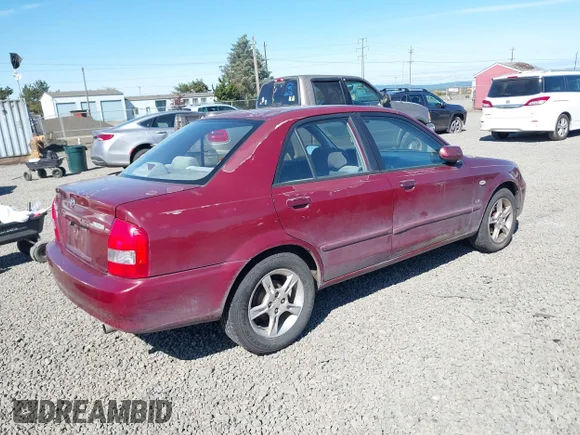 ✅ 2003 Mazda Protege DX • VIN: JM1BJ225930195479 • Лот: 42199689. Опубліковано раніше на IAAI з пробігом 148 382 миль. Безкоштовний доступ до архіву аукціонних продажів зі США та докладний звіт про історію автомобіля на DreamBid. Зображення 4.