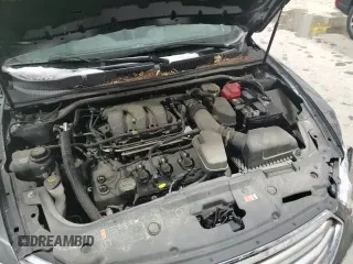 ✅ 2018 Ford Taurus SEL • VIN: 1FAHP2E81JG105007 • Lot: 95456475. Listed on Copart with 42,776 mi. Free auction sales archive from the USA and detailed vehicle history report at DreamBid. Image 13.