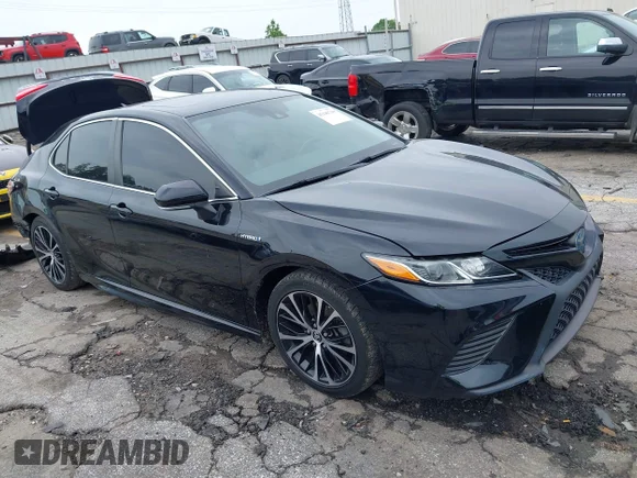 ✅ 2019 Toyota Camry Hybrid LE • VIN: 4T1B21HK0KU012557 • Лот: 45246729. Опубликован ранее на IAAI с пробегом 81 659 миль. Бесплатный доступ к архиву аукционных продаж из США и подробный отчёт об истории автомобиля на DreamBid. Изображение 1.