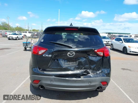 ✅ 2016 Mazda CX-5 Touring • VIN: JM3KE2CYXG0799049 • Lot: 44738213. Listed on IAAI with 116,806 mi. Free auction sales archive from the USA and detailed vehicle history report at DreamBid. Image 6.