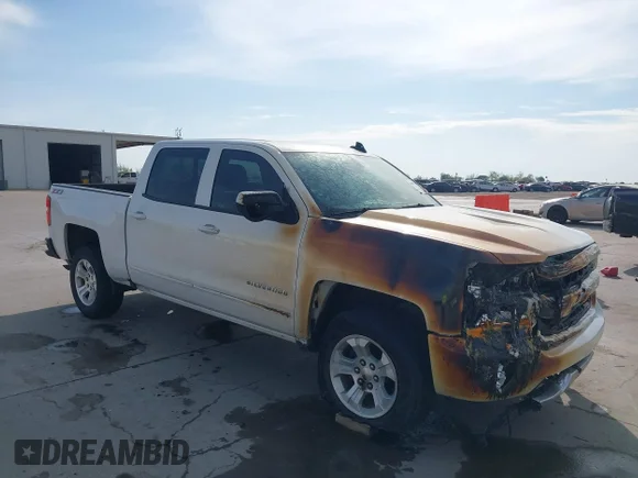 ✅ 2018 Chevrolet Silverado 1500 LT • VIN: 3GCUKREC6JG628189 • Lot: 44650376. Listed on IAAI with 121,978 mi. Free auction sales archive from the USA and detailed vehicle history report at DreamBid. Image 1.