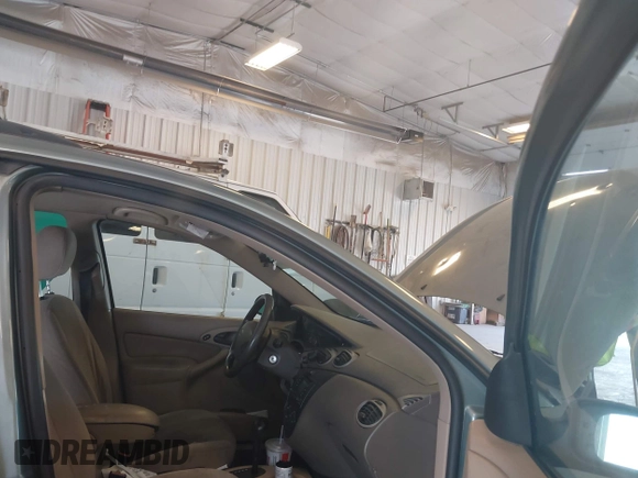 ✅ 2003 Ford Focus SE Fleet • VIN: 1FAFP36383W120516 • Lot: 43027100. Wystawiony na IAAI z przebiegiem Nie podano. Bezpłatny archiwum sprzedaży aukcyjnych z USA i szczegółowy raport historii pojazdu na DreamBid. Zdjęcie 5.