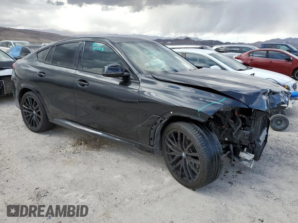 ✅ 2022 BMW X6 xDrive40i • VIN: 5UXCY6C00N9K77334 • Лот: 45946763. Опубліковано раніше на Copart з пробігом 18 275 миль. Безкоштовний доступ до архіву аукціонних продажів зі США та докладний звіт про історію автомобіля на DreamBid. Зображення 4.