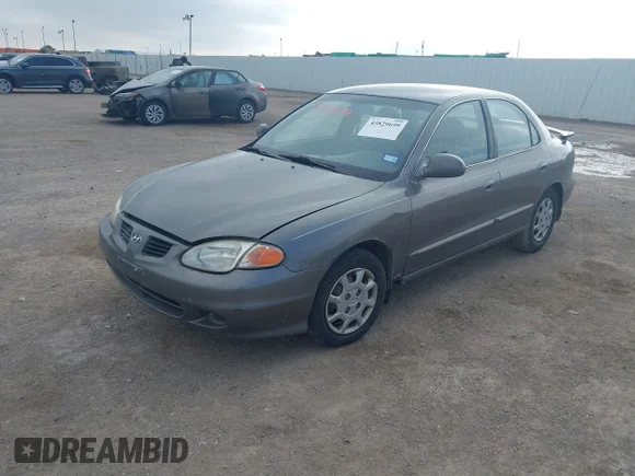 ✅ 2000 Hyundai Elantra GLS • VIN: KMHJF35F7YU897612 • Лот: 43829699. Опубліковано раніше на IAAI з пробігом 167 688 миль. Безкоштовний доступ до архіву аукціонних продажів зі США та докладний звіт про історію автомобіля на DreamBid. Зображення 2.