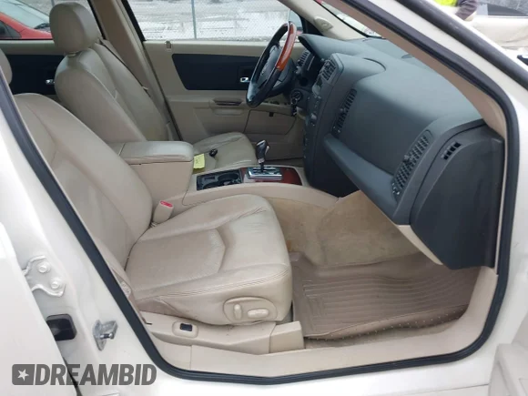 ✅ 2004 Cadillac SRX • VIN: 1GYDE637440125209 • Lot: 41190702. Wystawiony na IAAI z przebiegiem 166 952 mil. Bezpłatny archiwum sprzedaży aukcyjnych z USA i szczegółowy raport historii pojazdu na DreamBid. Zdjęcie 5.