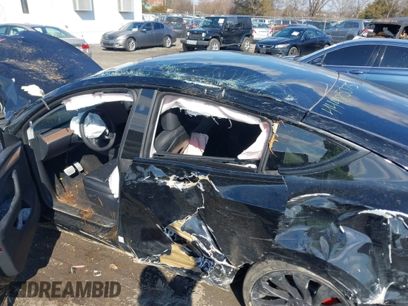✅ 2025 Tesla Model Y Performance • VIN: 7SAYGDEF8SF310455 • Lot: 44485075. Listed on IAAI with Not provided. Free auction sales archive from the USA and detailed vehicle history report at DreamBid. Image 6.