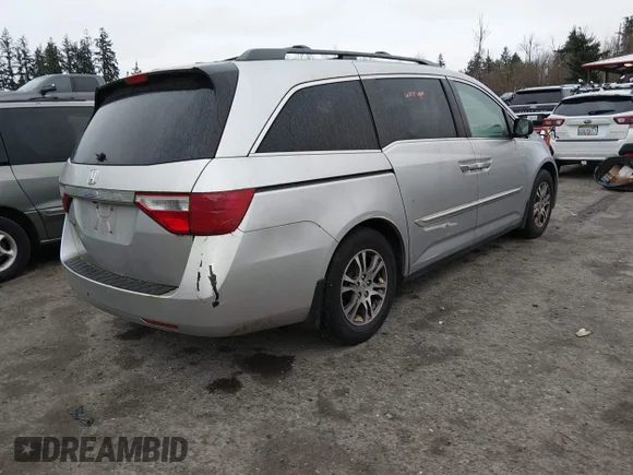✅ 2011 Honda Odyssey EX-L • VIN: 5FNRL5H63BB025709 • Lot: 44119814. Listed on IAAI with 137,636 mi. Free auction sales archive from the USA and detailed vehicle history report at DreamBid. Image 4.