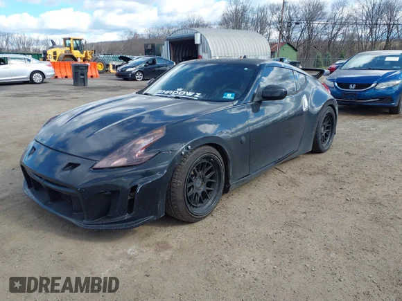 ✅ 2013 Nissan 370Z • VIN: JN1AZ4EH8DM881967 • Lot: 44682963. Wystawiony na IAAI z przebiegiem 134 922 mil. Bezpłatny archiwum sprzedaży aukcyjnych z USA i szczegółowy raport historii pojazdu na DreamBid. Zdjęcie 2.