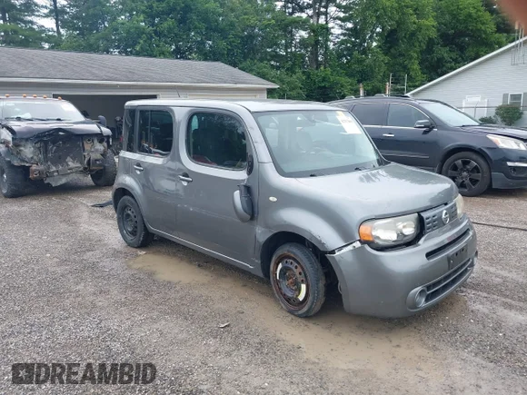 ✅ 2010 Nissan Cube SL • VIN: JN8AZ2KR5AT163779 • Lot: 42517859. Wystawiony na IAAI z przebiegiem 228 006 mil. Bezpłatny archiwum sprzedaży aukcyjnych z USA i szczegółowy raport historii pojazdu na DreamBid. Zdjęcie 1.