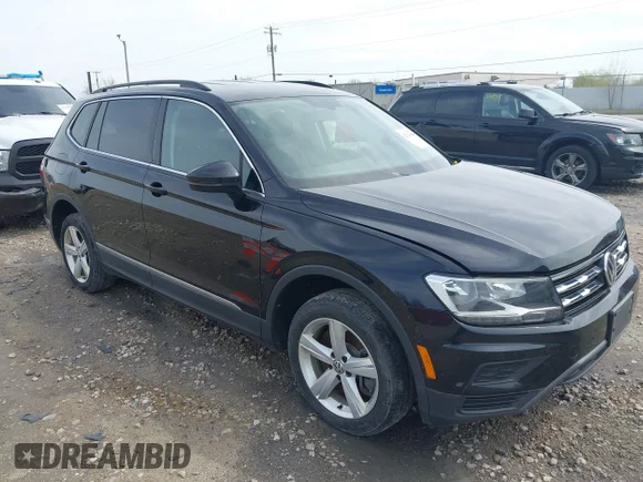 ✅ 2021 Volkswagen Tiguan SE • VIN: 3VV2B7AX4MM050282 • Лот: 42124808. Опубліковано раніше на IAAI з пробігом 80 082 миль. Безкоштовний доступ до архіву аукціонних продажів зі США та докладний звіт про історію автомобіля на DreamBid. Зображення 1.