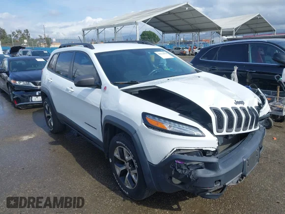 ✅ 2015 Jeep Cherokee Trailhawk • VIN: 1C4PJMBB5FW595600 • Lot: 44374054. Wystawiony na IAAI z przebiegiem 167 589 mil. Bezpłatny archiwum sprzedaży aukcyjnych z USA i szczegółowy raport historii pojazdu na DreamBid. Zdjęcie 1.