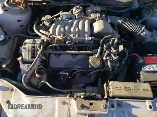 ✅ 1999 Ford Taurus SE • VIN: 1FAFP58U5XG240517 • Lot: 83514044. Wystawiony na Copart z przebiegiem 101 092 mil. Bezpłatny archiwum sprzedaży aukcyjnych z USA i szczegółowy raport historii pojazdu na DreamBid. Zdjęcie 13.