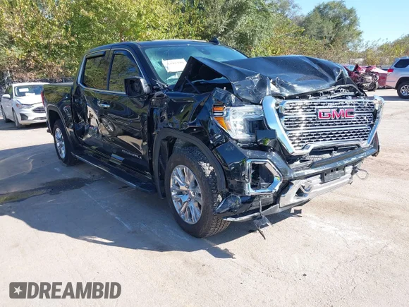 ✅ 2021 GMC Sierra 1500 Denali • VIN: 3GTU9FED7MG438165 • Lot: 43399390. Listed on IAAI with 61,959 mi. Free auction sales archive from the USA and detailed vehicle history report at DreamBid. Image 1.