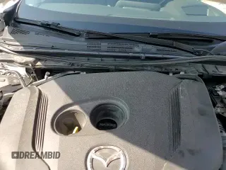 ✅ 2023 Mazda 3 Premium Plus • VIN: 3MZBPBEY5PM372601 • Лот: 62743565. Опубликован ранее на Copart с пробегом 25 212 миль. Бесплатный доступ к архиву аукционных продаж из США и подробный отчёт об истории автомобиля на DreamBid. Изображение 15.