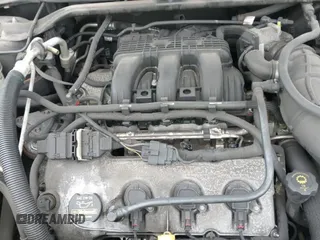 ✅ 2008 Mercury Sable Premier • VIN: 1MEHM43W58G621038 • Lot: 42524980. Listed on IAAI with 128,171 mi. Free auction sales archive from the USA and detailed vehicle history report at DreamBid. Image 14.