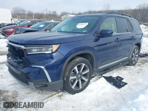 ✅ 2023 Honda Pilot Touring • VIN: 5FNYG1H74PB038395 • Lot: 44303722. Wystawiony na IAAI z przebiegiem 19 660 mil. Bezpłatny archiwum sprzedaży aukcyjnych z USA i szczegółowy raport historii pojazdu na DreamBid. Zdjęcie 2.