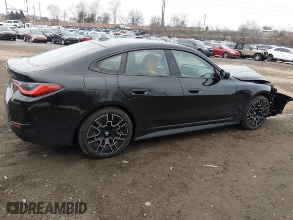 ✅ 2025 BMW i4 xDrive40 • VIN: WBY43HD02SFV80559 • Лот: 44373147. Опубликован ранее на IAAI с пробегом 720 миль. Бесплатный доступ к архиву аукционных продаж из США и подробный отчёт об истории автомобиля на DreamBid. Изображение 4.