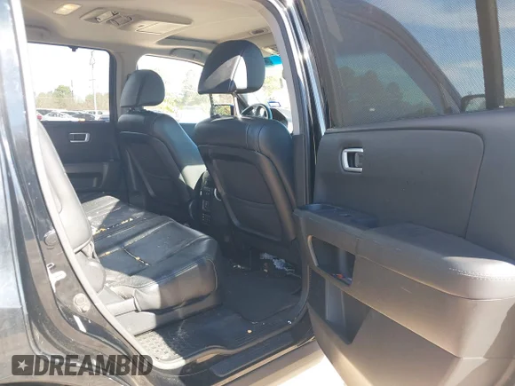 ✅ 2013 Honda Pilot Touring • VIN: 5FNYF3H99DB027467 • Лот: 44139474. Опубліковано раніше на IAAI з пробігом 154 322 миль. Безкоштовний доступ до архіву аукціонних продажів зі США та докладний звіт про історію автомобіля на DreamBid. Зображення 8.