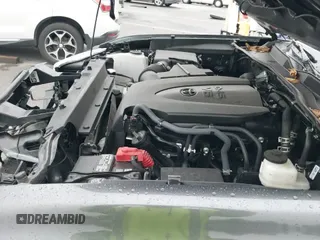 ✅ 2023 Toyota Tacoma TRD Off Road • VIN: 3TMCZ5AN5PM571369 • Lot: 43559181. Listed on IAAI with 56,795 mi. Free auction sales archive from the USA and detailed vehicle history report at DreamBid. Image 19.