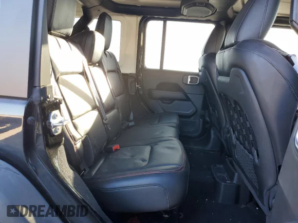 ✅ 2021 Jeep Wrangler Unlimited Rubicon • VIN: 1C4JJXFM6MW749330 • Lot: 61651892. Wystawiony na Copart z przebiegiem 4 994 mil. Bezpłatny archiwum sprzedaży aukcyjnych z USA i szczegółowy raport historii pojazdu na DreamBid. Zdjęcie 6.