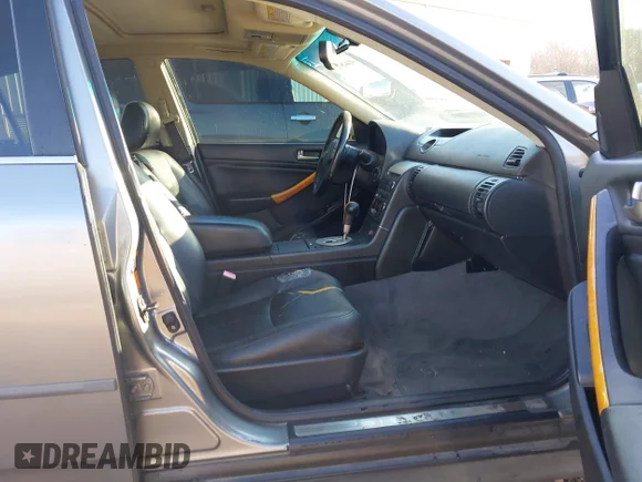 ✅ 2004 Infiniti G35 w/Leather • VIN: JNKCV51E44M608526 • Lot: 41445925. Wystawiony na IAAI z przebiegiem 342 652 mil. Bezpłatny archiwum sprzedaży aukcyjnych z USA i szczegółowy raport historii pojazdu na DreamBid. Zdjęcie 5.