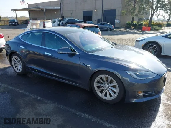 ✅ 2017 Tesla Model S 60 • VIN: 5YJSA1E17HF221525 • Lot: 41058228. Listed on IAAI with 82,233 mi. Free auction sales archive from the USA and detailed vehicle history report at DreamBid. Image 1.