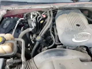 2001 Chevrolet Suburban LT z VIN 1GNEC16T61J257994, wystawiony jako Copart lot #82722074 z przebiegiem 251 319 mil mil oraz Czysty tytuł • Clean title. Historia ofert i sprzedaży dostępna na DreamBid. Obrazek 14.