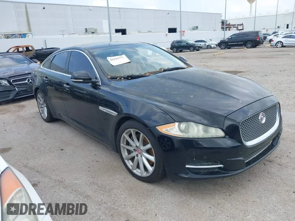 ✅ 2014 Jaguar XJ • VIN: SAJWA1CZ9E8V60522 • Лот: 41919728. Опубликован ранее на IAAI с пробегом 122 184 миль. Бесплатный доступ к архиву аукционных продаж из США и подробный отчёт об истории автомобиля на DreamBid. Изображение 1.