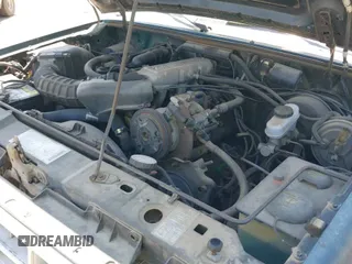 ✅ 1990 Ford Ranger • VIN: 1FTCR14T7LPB00718 • Lot: 42756062. Wystawiony na IAAI z przebiegiem 77 393 mil. Bezpłatny archiwum sprzedaży aukcyjnych z USA i szczegółowy raport historii pojazdu na DreamBid. Zdjęcie 12.