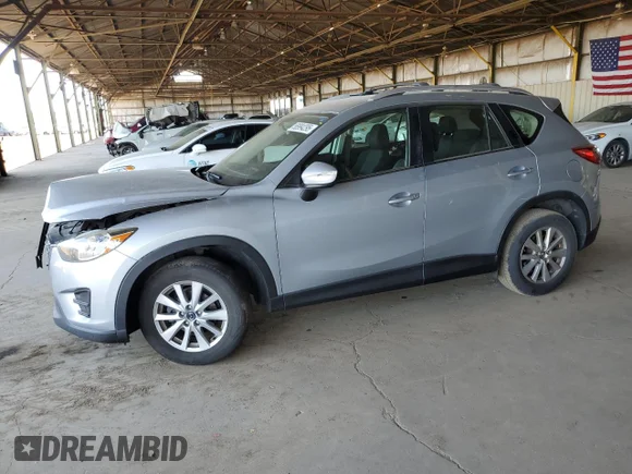 ✅ 2016 Mazda CX-5 Sport • VIN: JM3KE2BEXG0620533 • Lot: 58994295. Wystawiony na Copart z przebiegiem 129 474 mil. Bezpłatny archiwum sprzedaży aukcyjnych z USA i szczegółowy raport historii pojazdu na DreamBid. Zdjęcie 1.