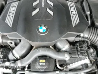 ✅ 2022 BMW 8 Series M850i • VIN: WBAGV8C0XNCH43670 • Lot: 42411551. Wystawiony na IAAI z przebiegiem 75 492 mil. Bezpłatny archiwum sprzedaży aukcyjnych z USA i szczegółowy raport historii pojazdu na DreamBid. Zdjęcie 19.