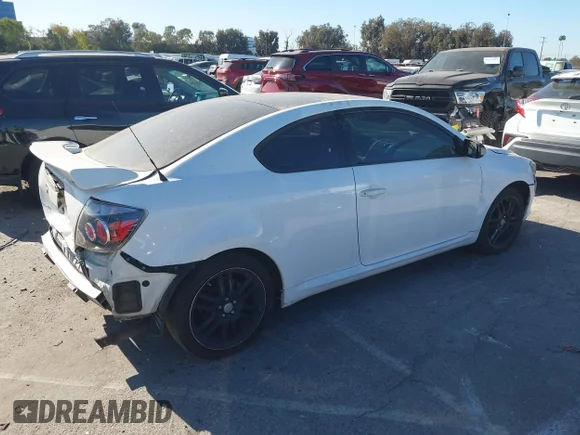 ✅ 2009 Scion tC • VIN: JTKDE167990282688 • Лот: 41310013. Опубліковано раніше на IAAI з пробігом 323 914 миль. Безкоштовний доступ до архіву аукціонних продажів зі США та докладний звіт про історію автомобіля на DreamBid. Зображення 4.