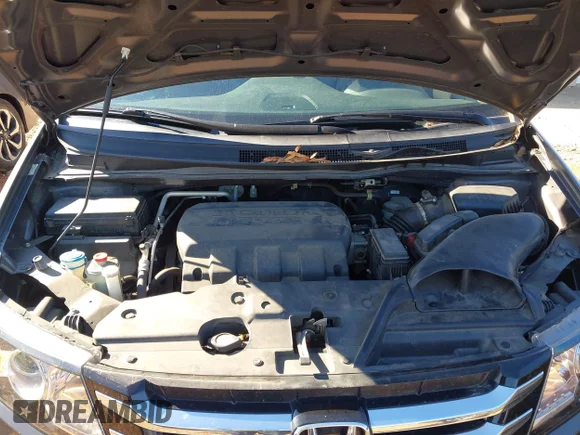 ✅ 2015 Honda Odyssey EX-L • VIN: 5FNRL5H67FB051591 • Lot: 44109628. Listed on IAAI with 123,053 mi. Free auction sales archive from the USA and detailed vehicle history report at DreamBid. Image 10.