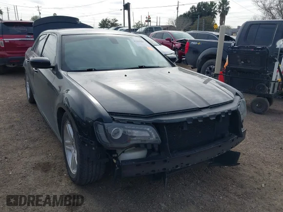 ✅ 2015 Chrysler 300 S • VIN: 2C3CCABT9FH882702 • Lot: 41419489. Listed on IAAI with 180,091 mi. Free auction sales archive from the USA and detailed vehicle history report at DreamBid. Image 1.