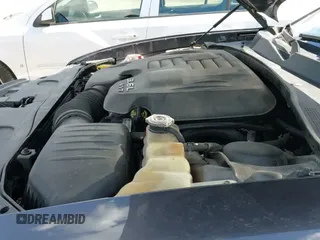 ✅ 2013 Dodge Charger SXT • VIN: 2C3CDXJG4DH552838 • Lot: 43083081. Listed on IAAI with 220,488 mi. Free auction sales archive from the USA and detailed vehicle history report at DreamBid. Image 19.