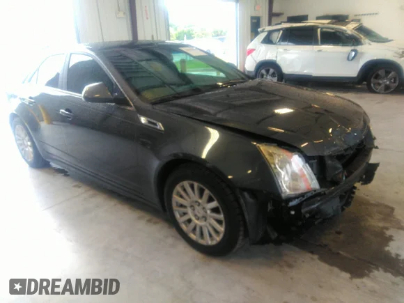 ✅ 2013 Cadillac CTS Luxury • VIN: 1G6DE5E54D0156491 • Lot: 39844556. Wystawiony na IAAI z przebiegiem 104 089 mil. Bezpłatny archiwum sprzedaży aukcyjnych z USA i szczegółowy raport historii pojazdu na DreamBid. Zdjęcie 1.