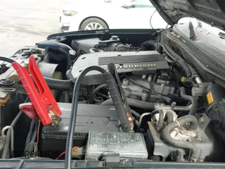 ✅ 2000 Mitsubishi Montero Sport LS • VIN: JA4LS31H1YP004763 • Lot: 43795635. Wystawiony na IAAI z przebiegiem 222 467 mil. Bezpłatny archiwum sprzedaży aukcyjnych z USA i szczegółowy raport historii pojazdu na DreamBid. Zdjęcie 13.