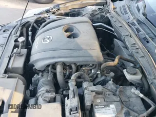 ✅ 2014 Mazda 3 S Touring • VIN: JM1BM1V36E1202848 • Lot: 42070830. Listed on IAAI with 142,203 mi. Free auction sales archive from the USA and detailed vehicle history report at DreamBid. Image 18.