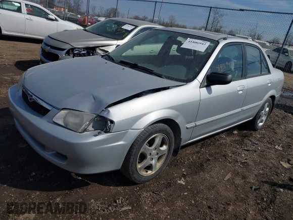 ✅ 2000 Mazda Protege ES • VIN: JM1BJ2233Y0298712 • Lot: 41806942. Listed on IAAI with 67,699 mi. Free auction sales archive from the USA and detailed vehicle history report at DreamBid. Image 2.