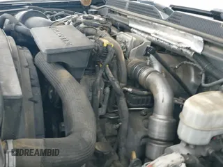 ✅ 2018 GMC Sierra 2500HD Denali • VIN: 1GT12UEY9JF257743 • Лот: 42712425. Опубликован ранее на IAAI с пробегом Не указан. Бесплатный доступ к архиву аукционных продаж из США и подробный отчёт об истории автомобиля на DreamBid. Изображение 19.