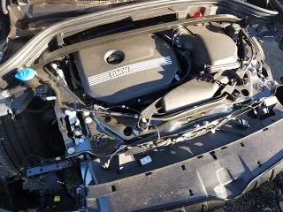 ✅ 2025 BMW X1 xDrive28i • VIN: WBX73EF05S5298211 • Лот: 86806095. Опубликован ранее на Copart с пробегом 4 176 миль. Бесплатный доступ к архиву аукционных продаж из США и подробный отчёт об истории автомобиля на DreamBid. Изображение 13.