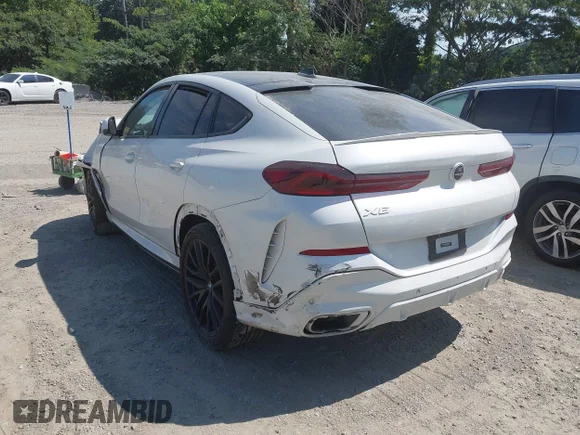 ✅ 2022 BMW X6 xDrive40i • VIN: 5UXCY6C02N9J06794 • Лот: 42850405. Опубліковано раніше на IAAI з пробігом 58 659 миль. Безкоштовний доступ до архіву аукціонних продажів зі США та докладний звіт про історію автомобіля на DreamBid. Зображення 3.